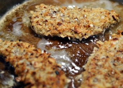 This is the perfect summer recipe. I loved it and I didn't feel guilty after eating it. I love fruit in my salads. But I have never tried peaches. Oh my it was good. And the dressing was delicious on top. This recipe has a little more to it, but it is a nice change! Battered chicken in a frying pan.