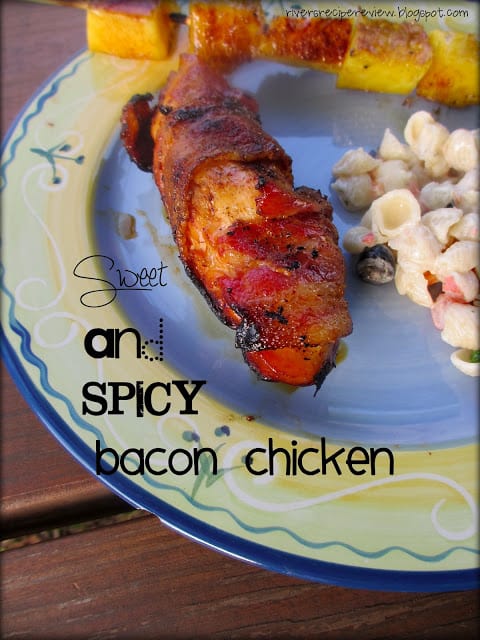 I loved this recipe because most of the chicken I make has some kind of marinade. Sweet and Spicy Bacon Chicken on a festive plate with a pineapple skewer and pasta salad.