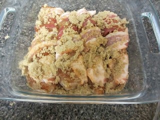 I loved this recipe because most of the chicken I make has some kind of marinade. Third step of arranging the bacon wrapped chicken in a cooking pan.