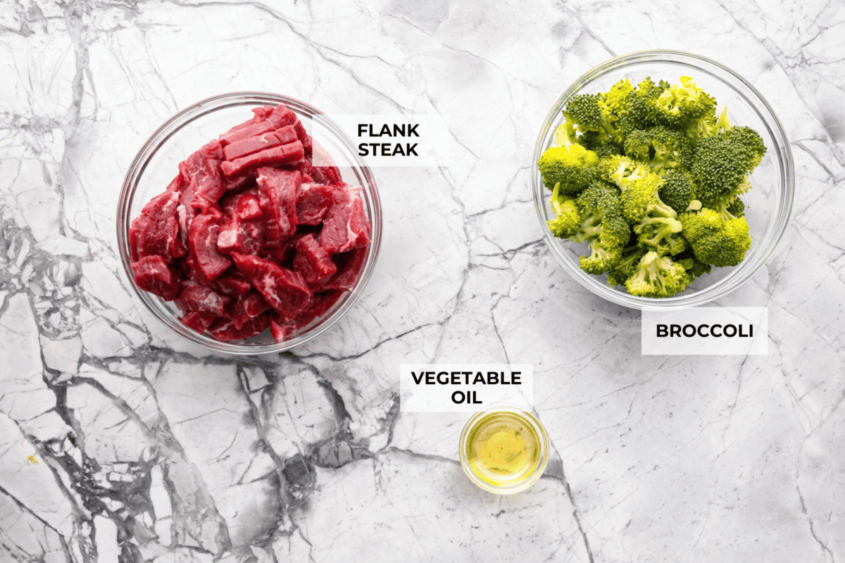 This Mongolian beef and broccoli recipe is the best P.F. Chang’s copycat recipe. You will love the combination of tender beef, vibrant broccoli and intensely flavorful sauce. Save yourself money while making your family happy with this quick and easy recipe. Overhead shot of labeled beef and broccoli ingredients.