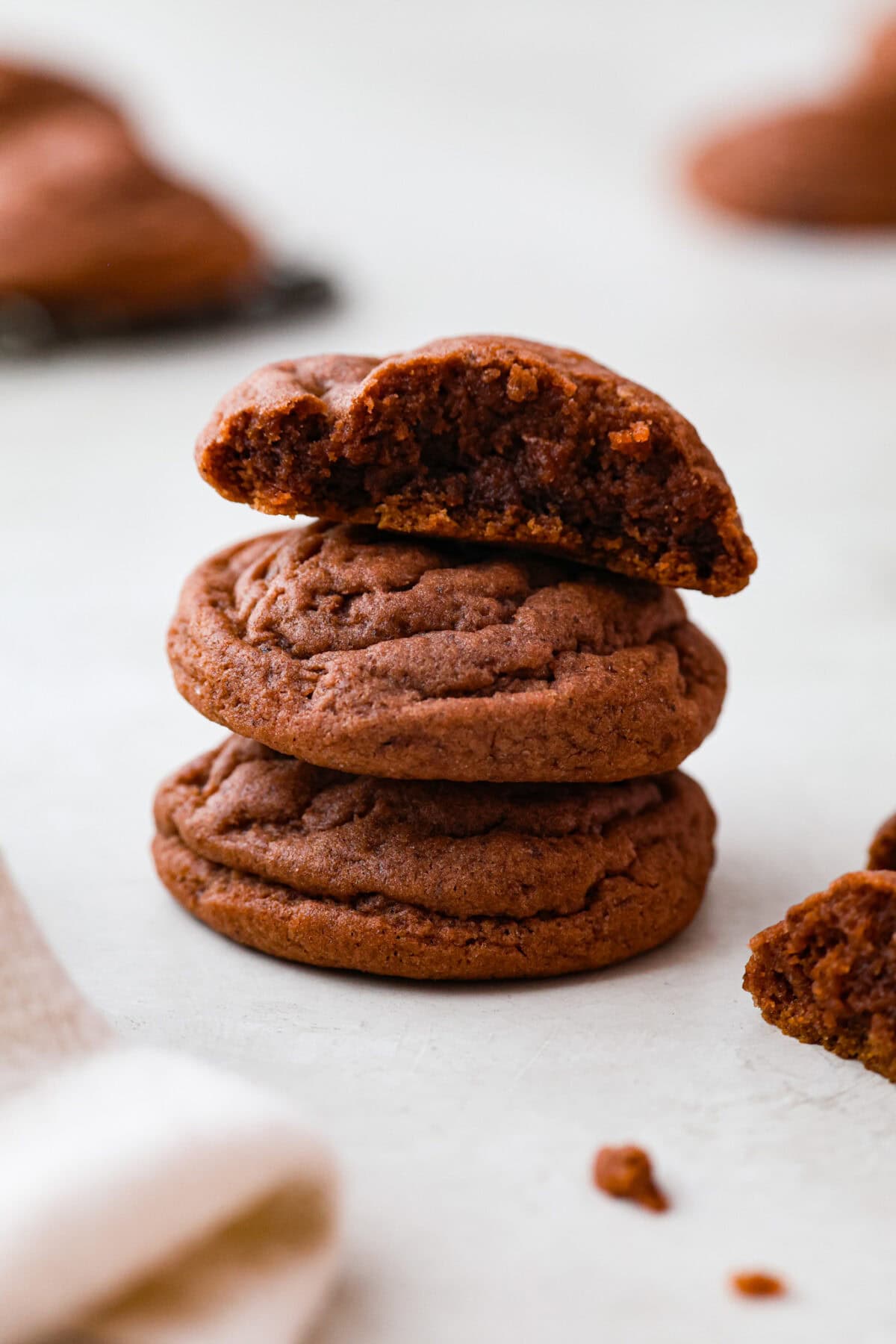 Chocolate Pudding Cookies are soft, chewy, and irresistibly delicious! They are quick and easy to bake and will be a huge hit with anyone who tries them! A stack of chocolate pudding cookies.