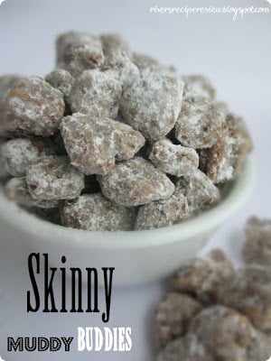 These are one addictingly good snack! I loved finding a recipe that cut some of the calories out! Skinny Muddy Buddies in a white bowl.
