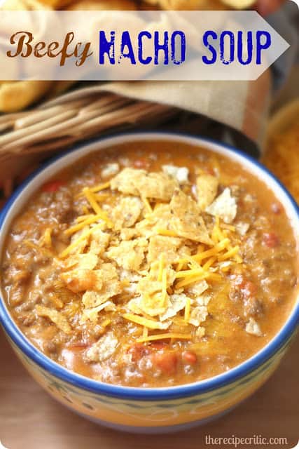 This beefy nacho soup is a perfect weeknight comfort dinner! Beefy nacho soup in a blue and white bowl.