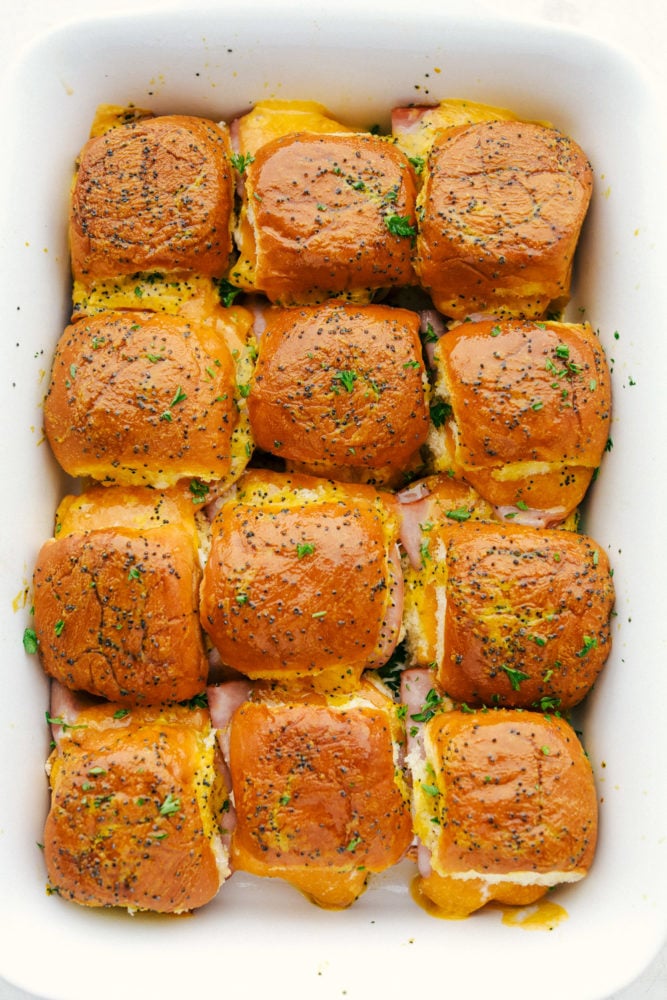 Overhead shot of baked ham and cheese sliders.