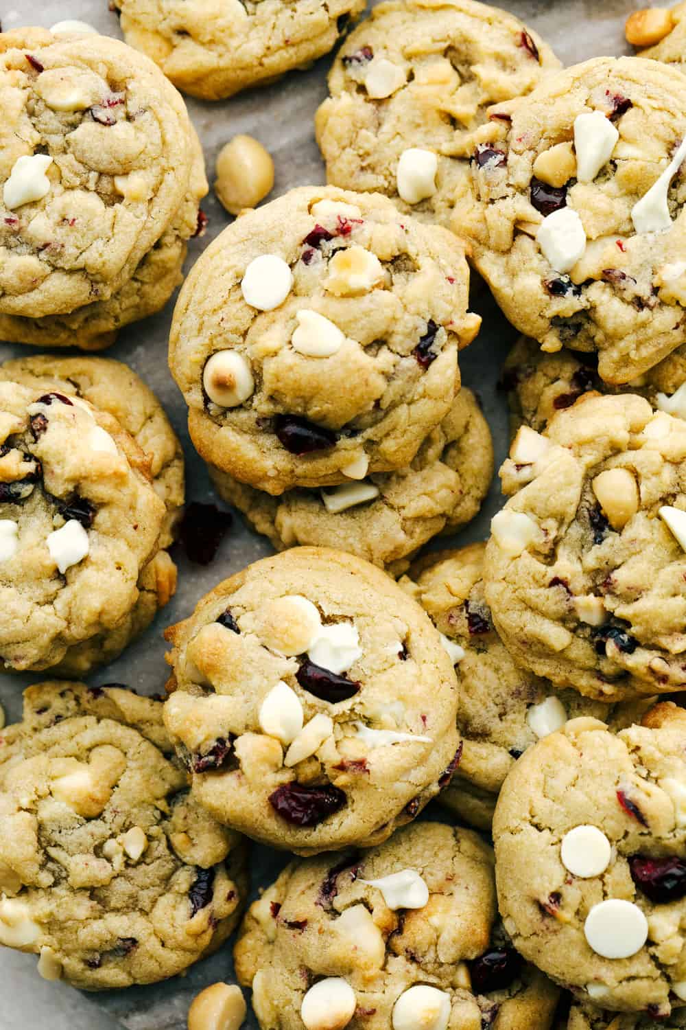 White Chocolate Cranberry Macadamia Cookies are the perfect combination, of chewy, crunchy, sweet and decadence all wrapped up in a cookie! These amazing cookies have great texture and flavor! Soft, chewy, White Chocolate Cranberry Macadamia Cookies.