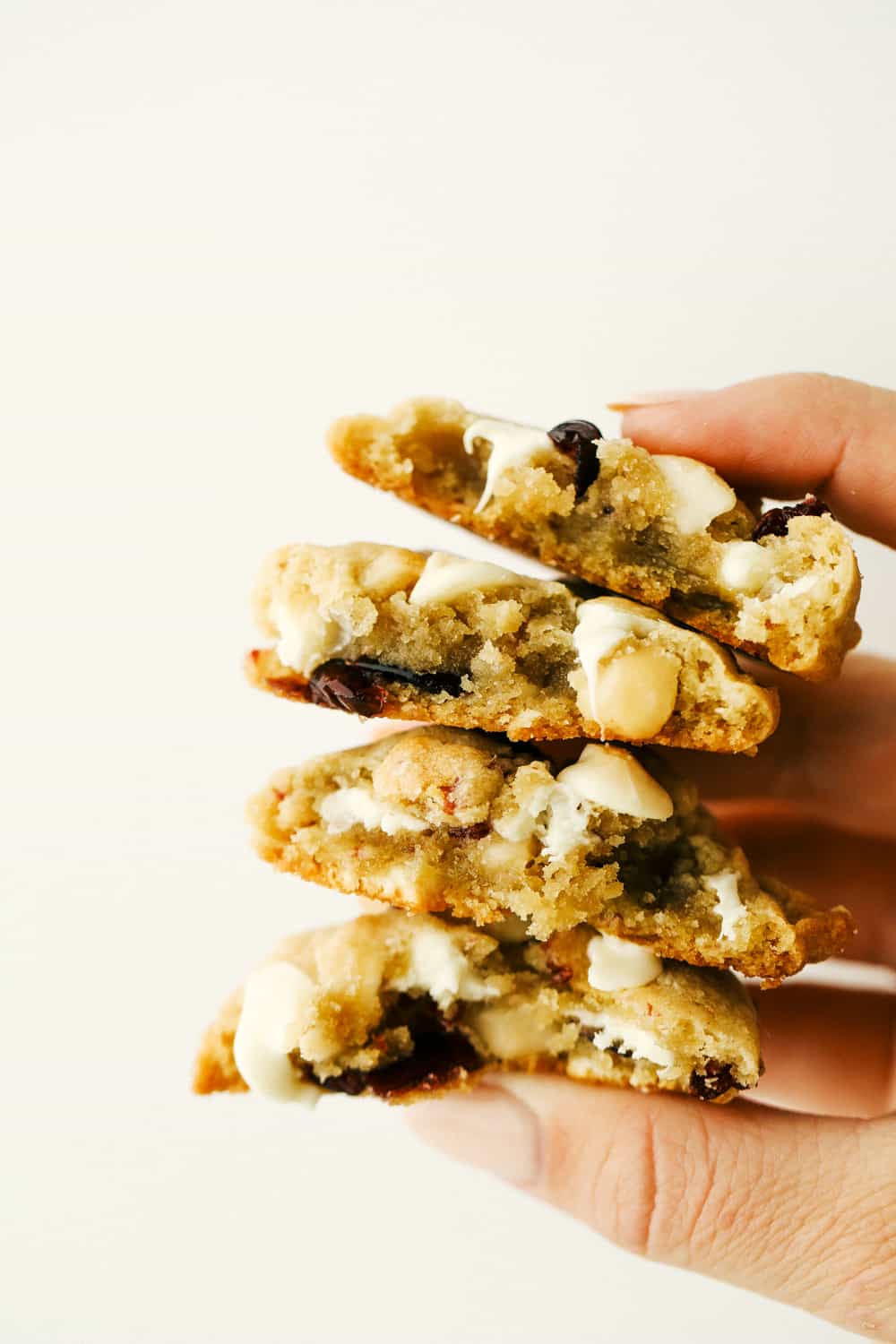 White Chocolate Cranberry Macadamia Cookies are the perfect combination, of chewy, crunchy, sweet and decadence all wrapped up in a cookie! These amazing cookies have great texture and flavor! Soft, chewy, White Chocolate Cranberry Macadamia Cookies.