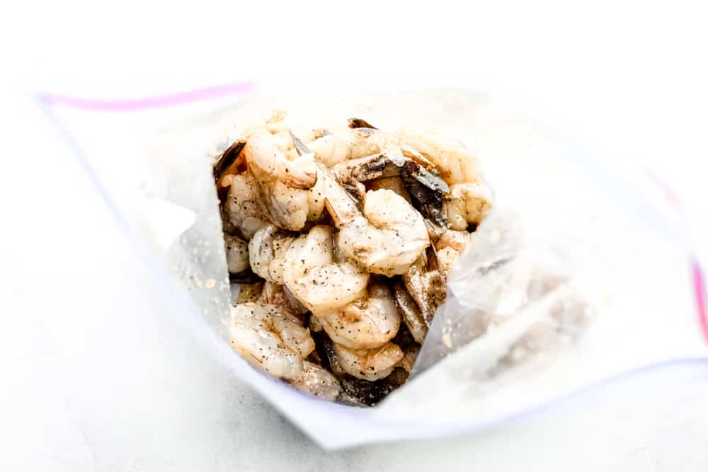 Honey Lime Shrimp is a delicious sweet and tangy shrimp that will be on your table in just 30 minutes! Simple and flavorful! shrimp in marinade for honey lime shrimp