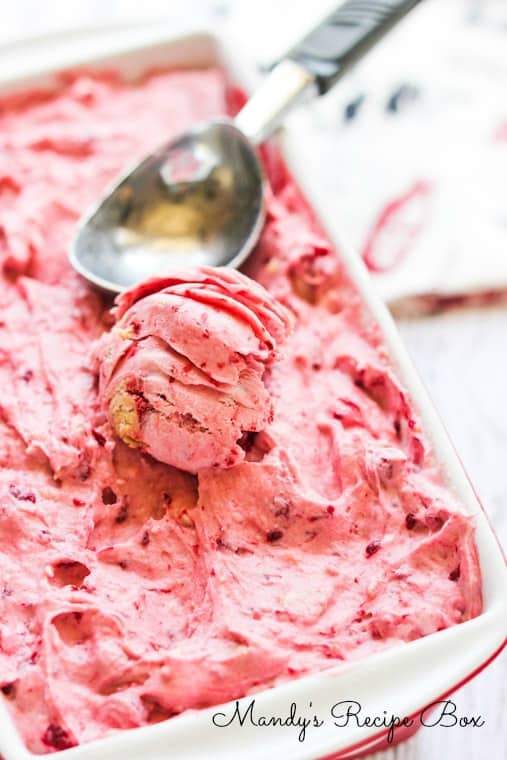 A delicious raspberry cheesecake ice cream and no ice cream maker is required! Raspberry Cheesecake Ice Cream with an ice cream scoop.