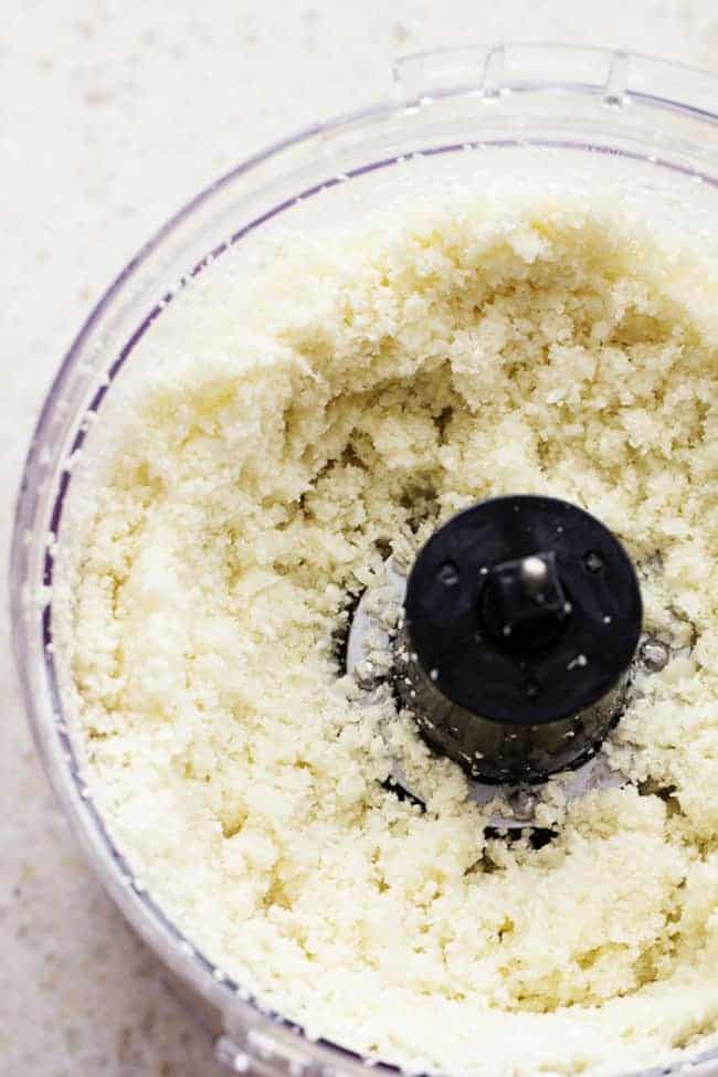 Looks and tastes exactlyย like fried rice! But so much healthier for you! Tastes amazing plain, or would also be great with some ham, chicken or meat added! Cauliflower in the food processor.