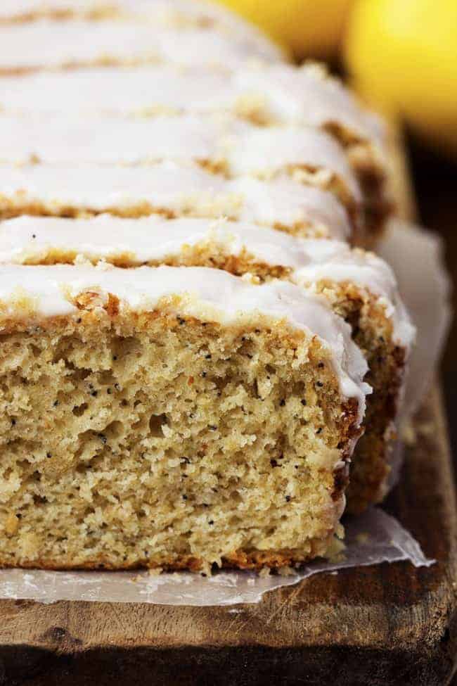 A delicious and healthier for you lemon poppyseed cake that is so moist and delicious! Healthy lemon poppyseed cake loaf sliced.