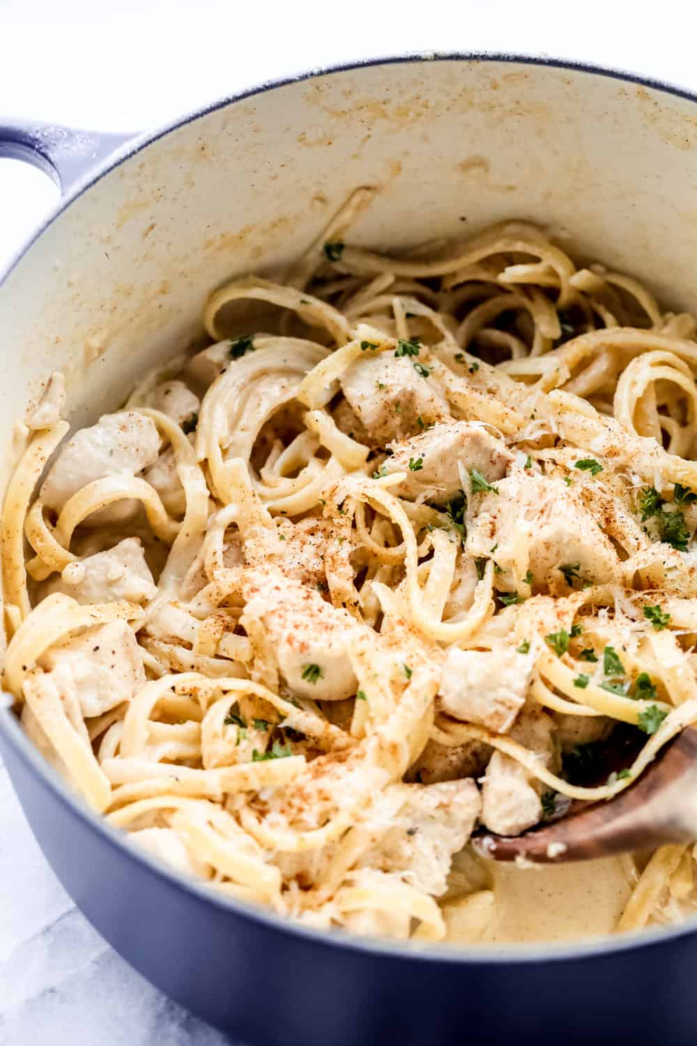 One Pot Cajun Chicken Alfredo Pasta is anย amazing one pot meal that is on the dinner table in less than 30 minutes! ย The cajun spice adds the perfect amount of flavor to the creamy alfredo sauce! One pot cajun chicken Alfredo Pasta