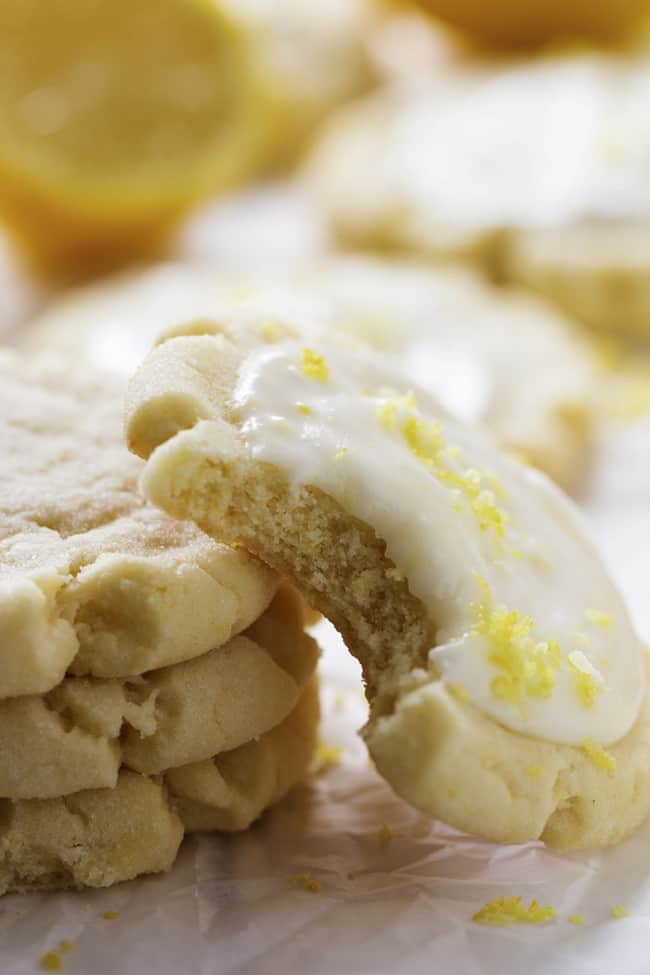 Amazingly soft and perfect lemon sugar cookies with the best lemon cream cheese frosting on top! Lemon sugar cookie close up of the inside.