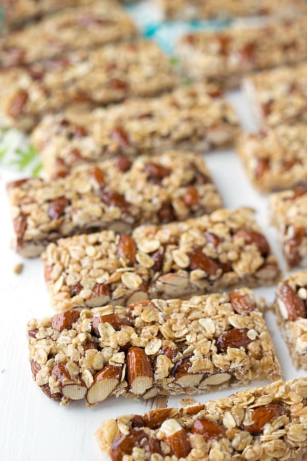 Easy almond granola bars! Almond granola bars laid in a row.