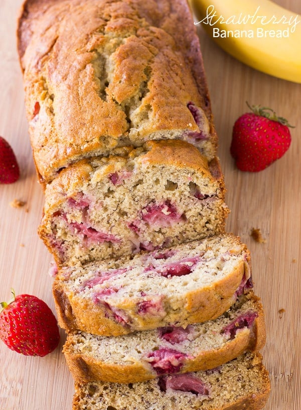 Strawberry Banana Bread is a blend of fresh, juicy strawberries mixed with bananas that make this bread soft and moist in every slice. This isย quick and easy bread that your family is going to love!ย Strawberry Banana Bread sliced