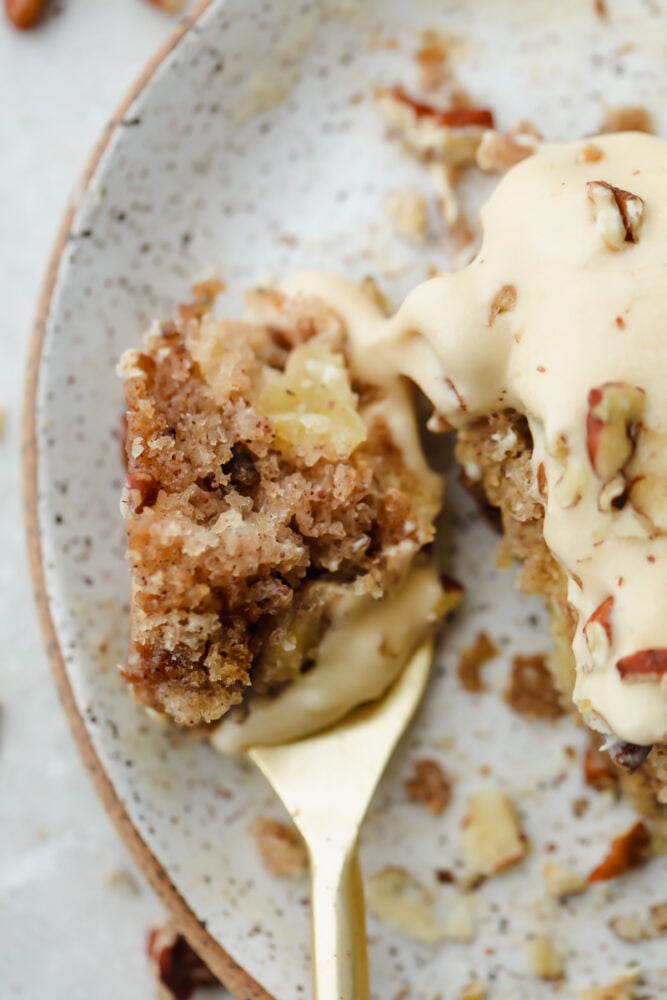 The most tender and moist apple pecan spice cake that you will make. And the brown sugar cream cheese frosting is absolutely delicious!