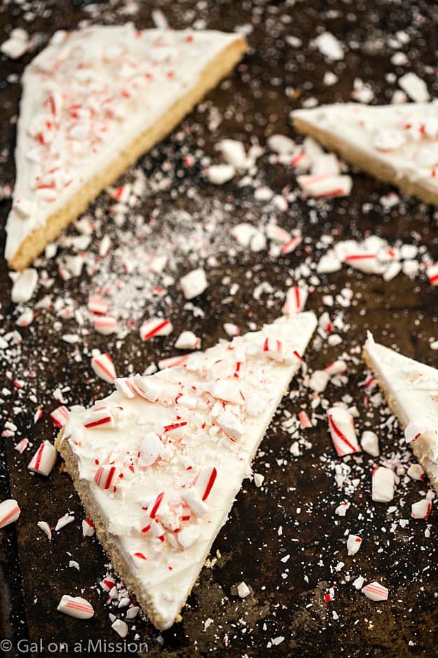 Frosted Peppermint Sugar Cookie Bars - Why do you need peppermint bark when you can have these incredibly easy sugar cookie bars? So moist with the creamiest frosting, then topped with chopped candy canes. Only one bowl is needed! Frosted Peppermint Sugar Cookie Bars - Why do you need ppeppermint bark when you can have these incredibly easy sugar cookie bars? So moist with the creamiest frosting, then topped with chopped candy canes. Only one bowl is needed!