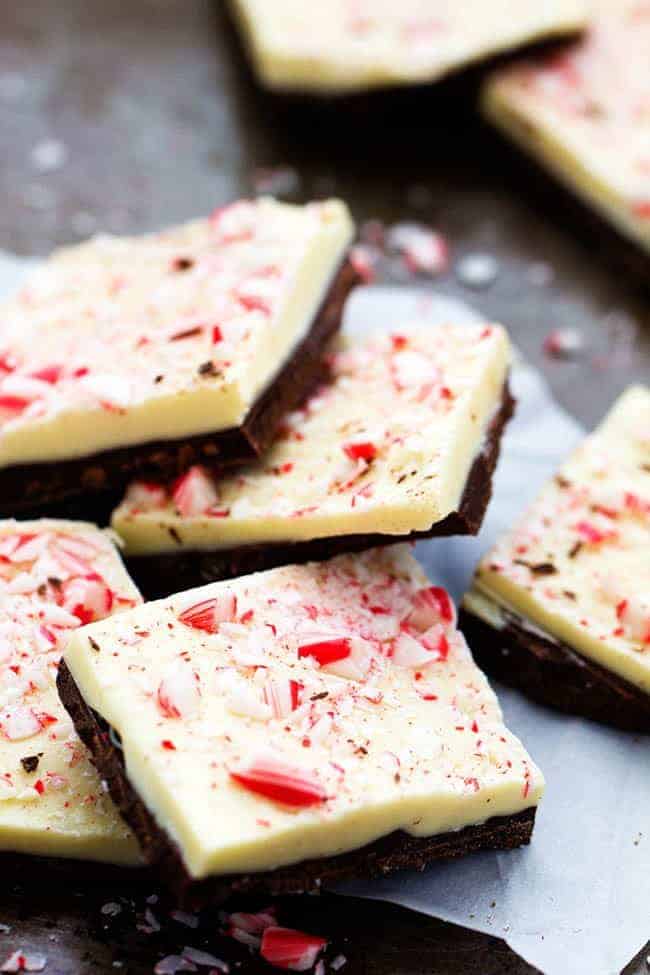Layered semi-sweet and white chocolate flavored with mint and topped with crushed candy canes. This is so easy to make and a holiday classic! peppermint bark stacked.
