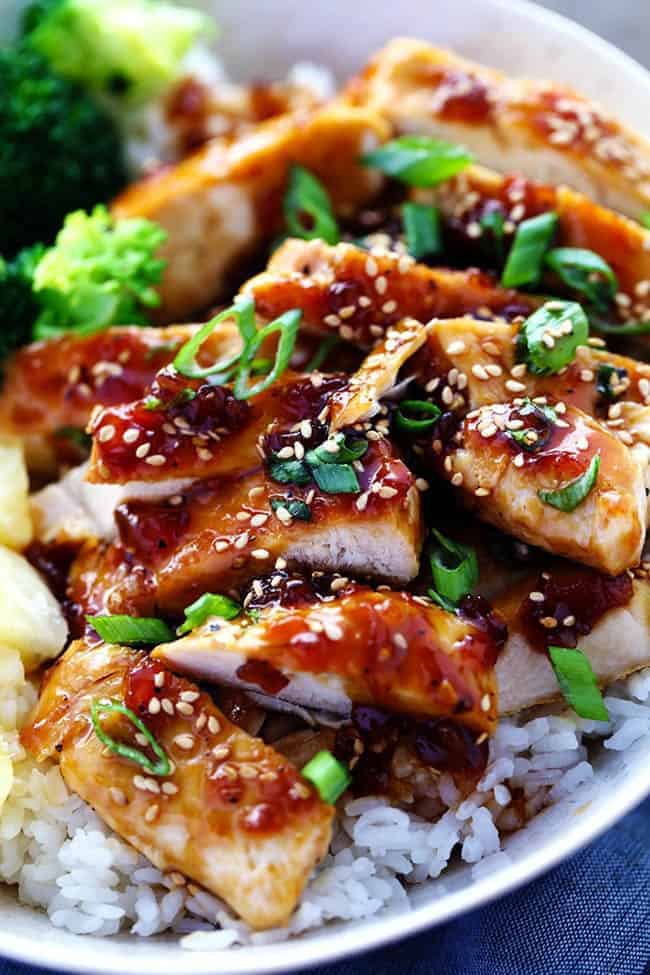 A sweet teriyaki sauce infused with pineapple and ginger bringing such an amazing marinade for this chicken! ย A quick 30 minute meal that you will make again and again!ย Teriyaki chicken with broccoli and onion over rice.