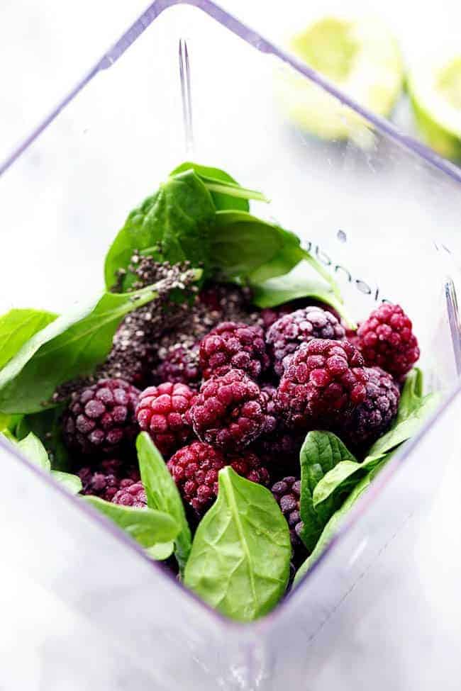 A quick and easy blackberry lime smoothie full of antioxidants and vitamins that your body needs! Fresh blackberries and spinach in a blender.
