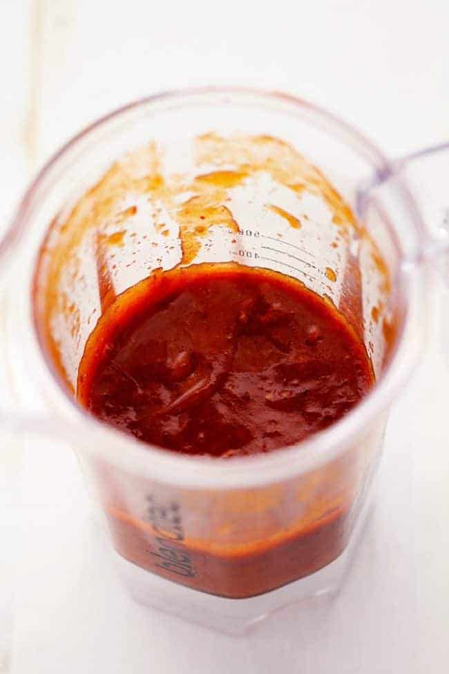 Honey Chipotle BBQ Chicken is sweet and tangy and the chipotle adds such a flavorful kick! You are going to love everything about this sauce and it will be a hit at your next gathering! Blender cup with Honey Chipotle sauce.