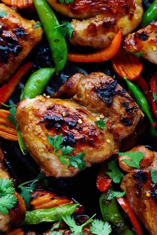 Thai Barbecue Chicken has a delicious thai marinade and is perfect served with some grilled veggies! The entire family will love this recipe! Close up photo of Thai Barbecue Chicken.