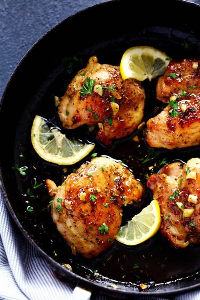 Glazed Lemon Honey Garlic Chicken is tender and juicy chicken cooked in the skillet toppedย the most amazing lemon honey garlic glaze! ย You are going to love this simple but full of flavor 30 minute meal!ย glazed lemon garlic honey chicken