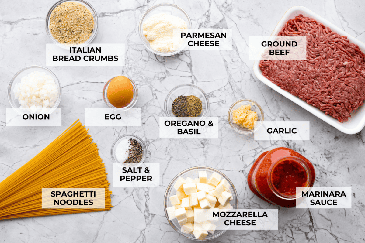 Mozzarella Stuffed Meatballs take classic meatballs to the next level! Tender and juicy with melty cheese on the inside. Serve these meatballs as a party appetizer or over spaghetti noodles for a hearty meal! Ingredients listed to make mozzarella stuffed meatballs.