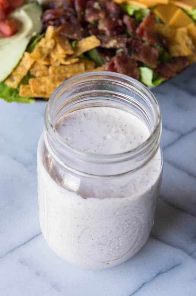 Top all of this with a creamy and delicious homemade salsa ranch dressing and there's no way this salad will disappoint. Salsa ranch dressing in a mason jar.