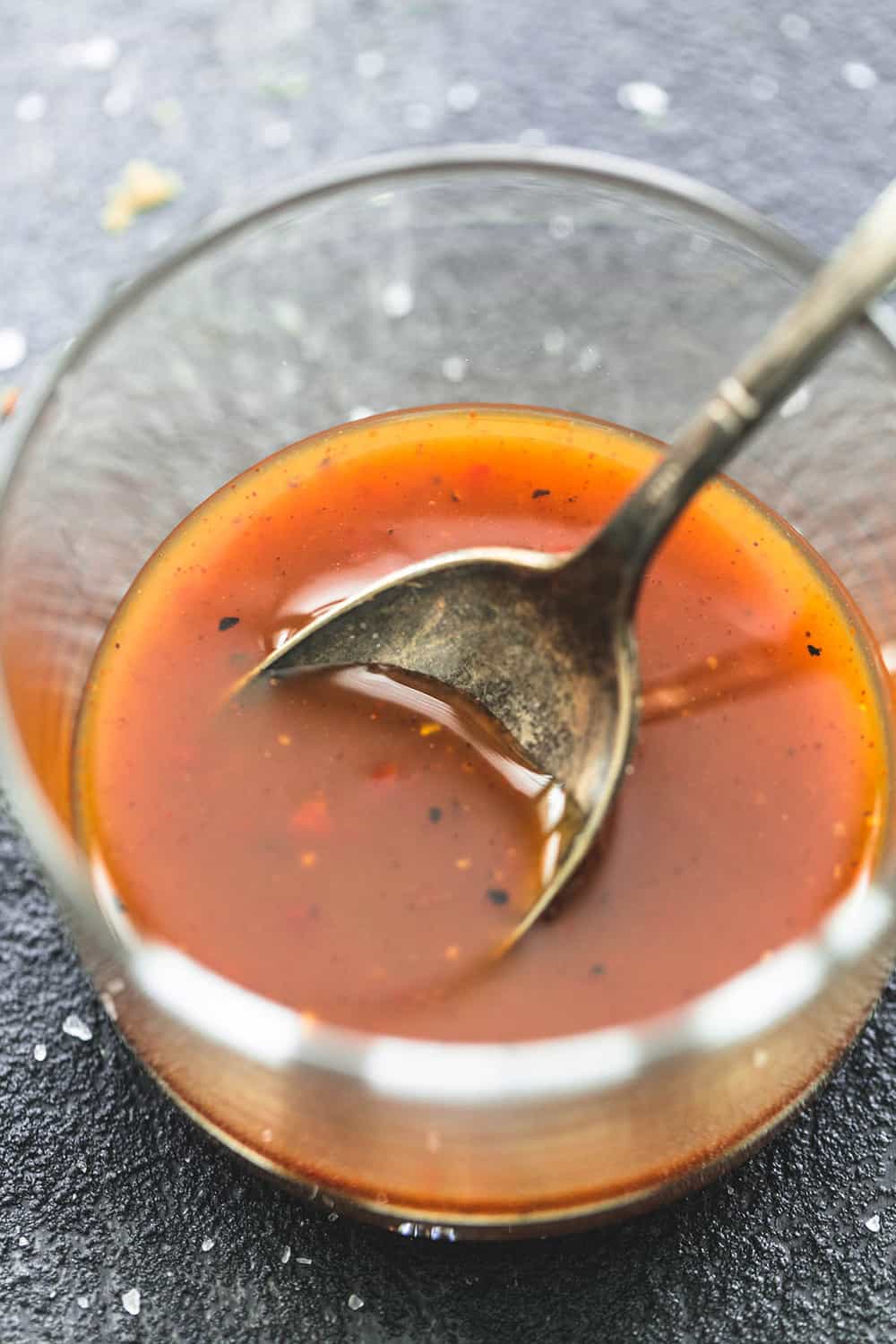 This simple chili lime marinade can work its magic in as little as a half hour but if you think ahead, it's 10 times better if you can let it hang out in the fridge for a few hours. Simple chili lime marinade in a glass.
