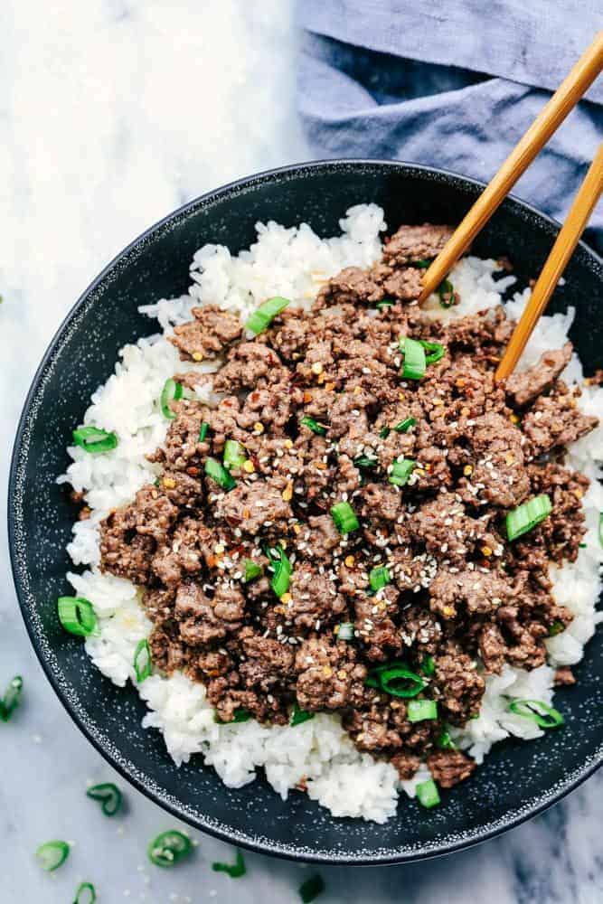 Korean Ground Beef and Rice Bowls are so incredibly easy to make andย will become a family favorite! ย This makes the perfect weeknight meal. Korean Ground Beef and Rice Bowls