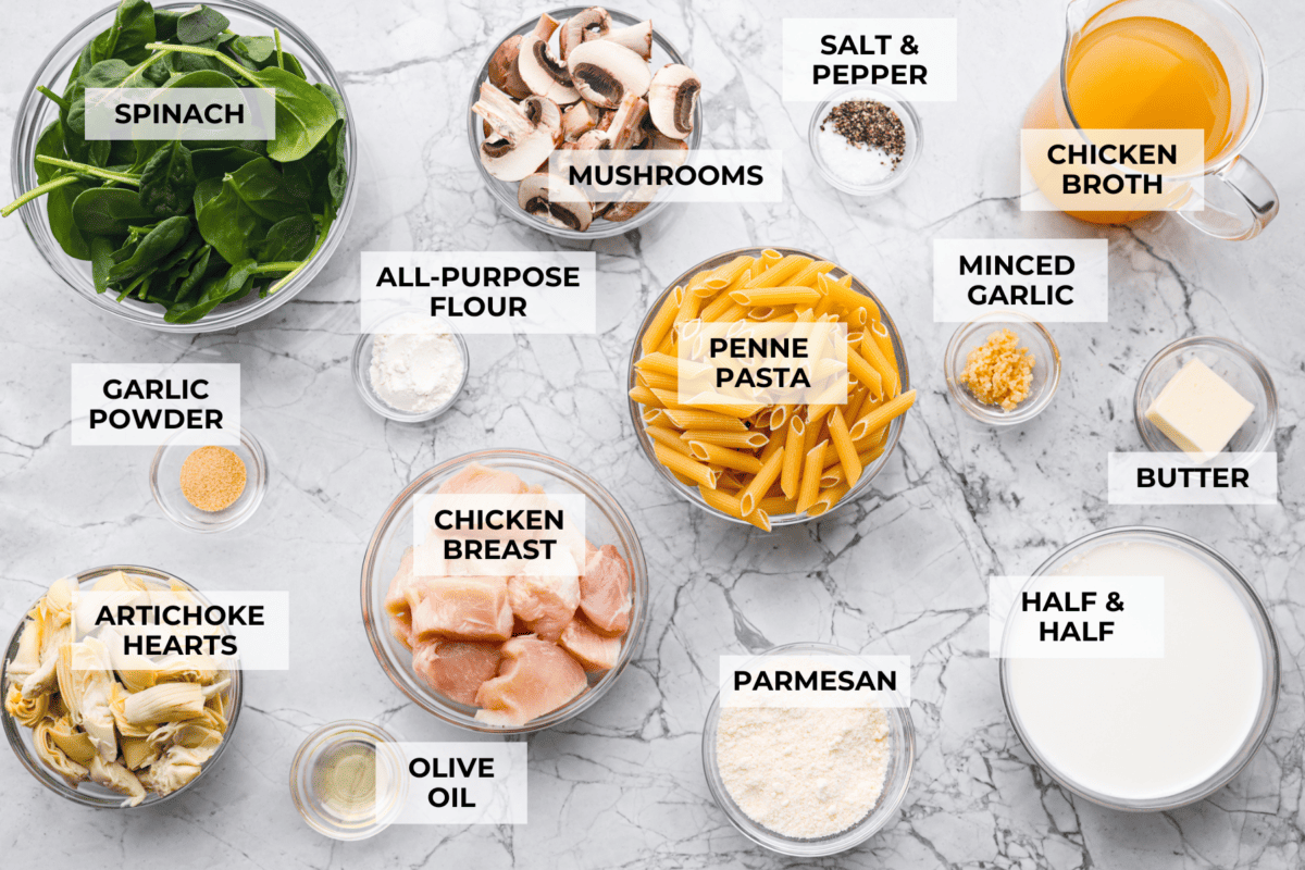 Creamy Spinach Mushroom Artichoke Chicken comes together in just 30 minutes with only one pot! It's a rich, flavorful meal I know you guys will love! Overhead shot of labeled ingredients.