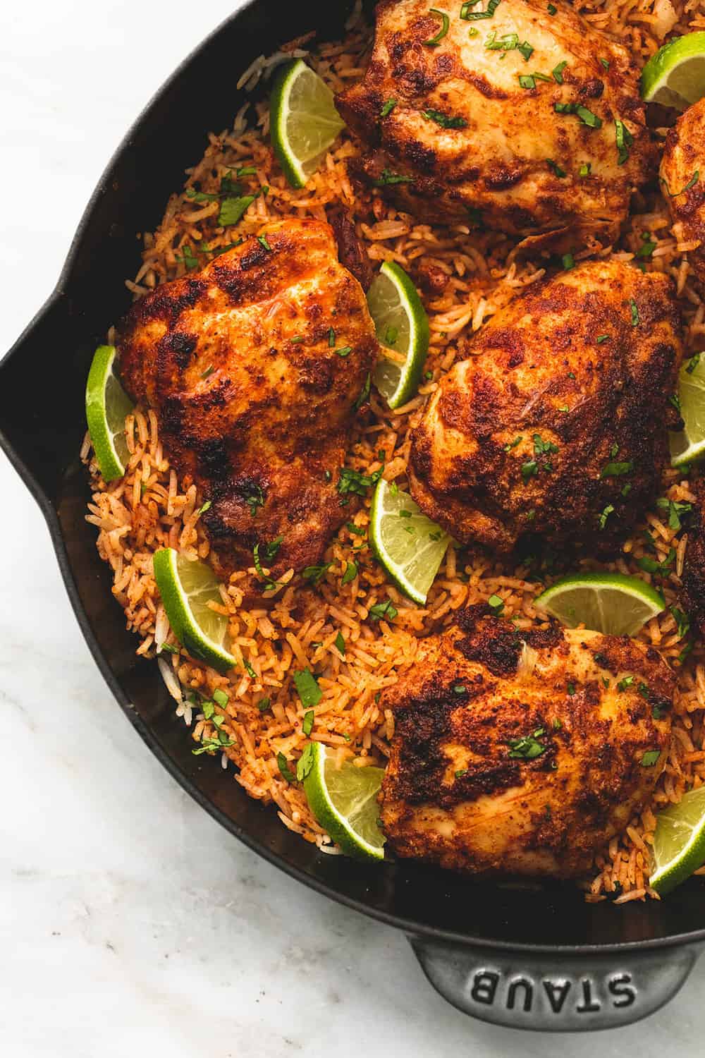 One Pan Chili Lime Chicken and Rice is made in one pan with minimal ingredients but is packed with amazing flavor! ย Your entire family will love this easy 3o minute meal! One pan chili lime chicken and rice