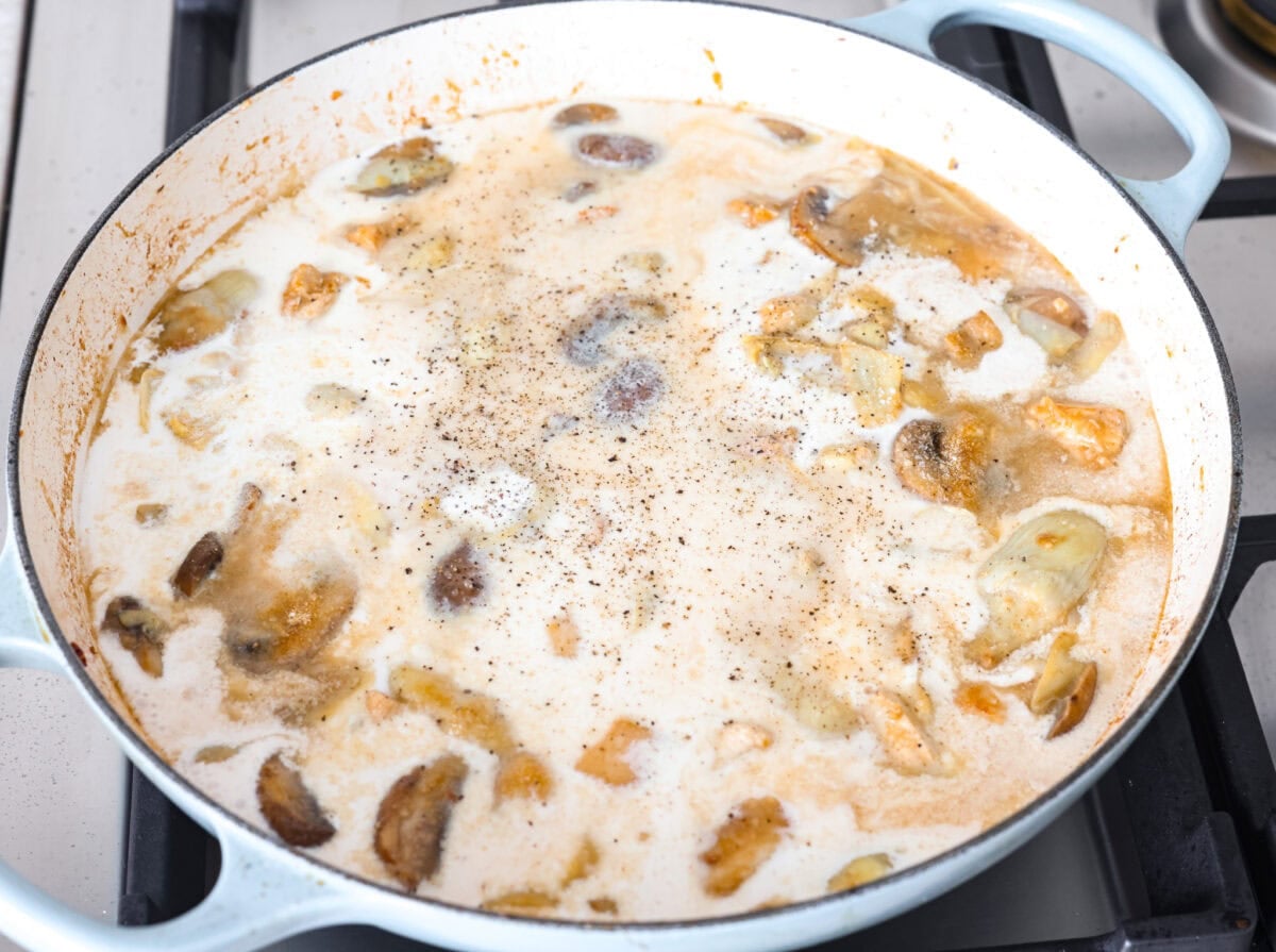 Creamy Spinach Mushroom Artichoke Chicken comes together in just 30 minutes with only one pot! It's a rich, flavorful meal I know you guys will love! Chicken broth, half and half and seasoning added to the chicken mixture.