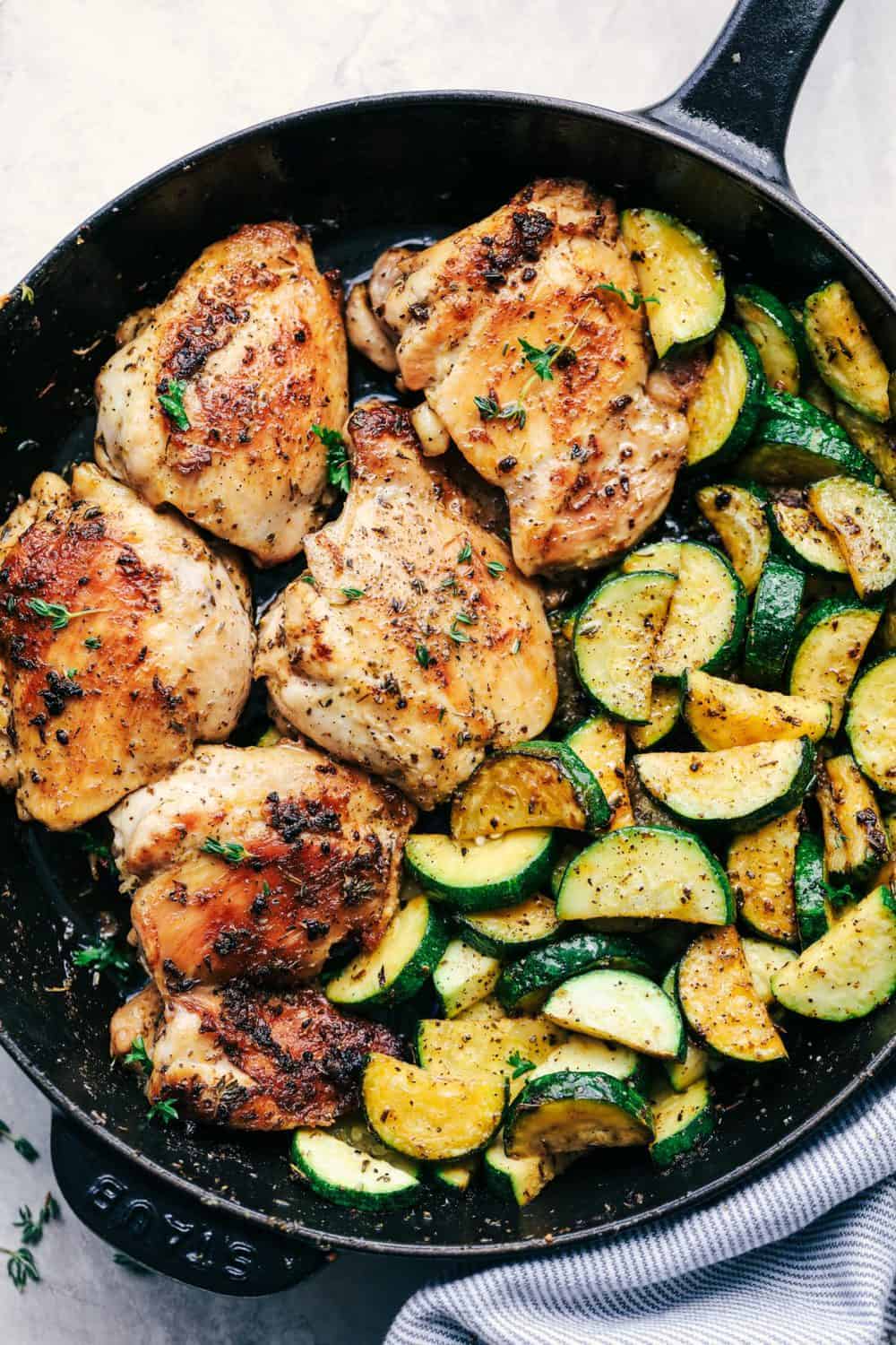 Buttery Garlic Herb Chicken with Zucchini is an easy 30 minute meal that has tender and juicy chicken cooked in a buttery garlic herb sauce with zucchini. This dish is cooked with fresh herbs and is incredible! Buttery Garlic Herb Chicken with Zucchini
