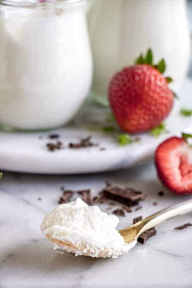 Coconut Mousse. This fluffy coconut mousse comes together quick and easy and is loaded with a cold, creamy coconut flavor! Top with your favorite toppings and it's the perfect summer dessert! Coconut Mousse scooped in a spoon.