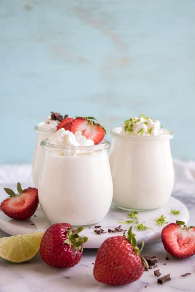 Coconut Mousse. This fluffy coconut mousse comes together quick and easy and is loaded with a cold, creamy coconut flavor! Top with your favorite toppings and it's the perfect summer dessert! Coconut Mousse in glass jars.