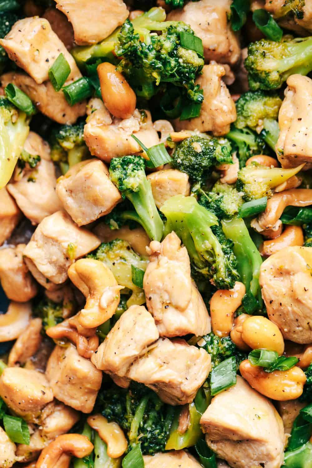 Garlic Chicken and Broccoli Cashew Stir Fry is the easiest meal to make and only requires one skillet! This meal is packed with amazing flavor and crunchy cashews and will become an instant favorite! Garlic Chicken and Broccoli Cashew Stir Fry close up.