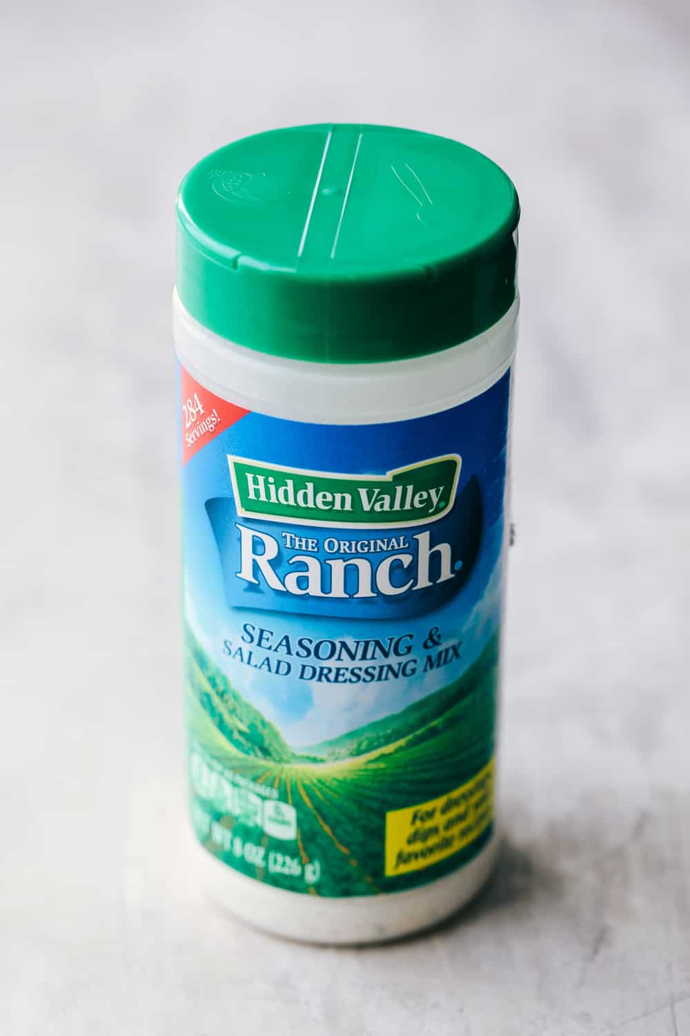 Garlic Ranch Smashed Potatoes are crispy on the outside and tender on the inside with the most incredible garlic ranch flavor! These make the perfect side dish or appetizer. Hidden valley ranch seasoning dressing mix in a bottle.