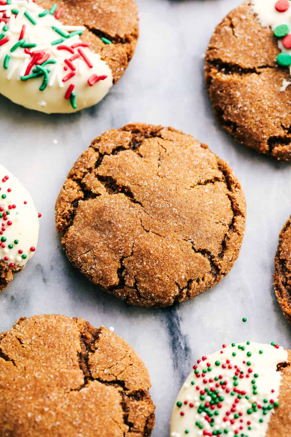 Best Ever Molasses Cookies have a slightly crisp sugar coated edge and a soft and chewy center. These are the perfect holiday cookie! Best Ever Molasses Cookies areal view.