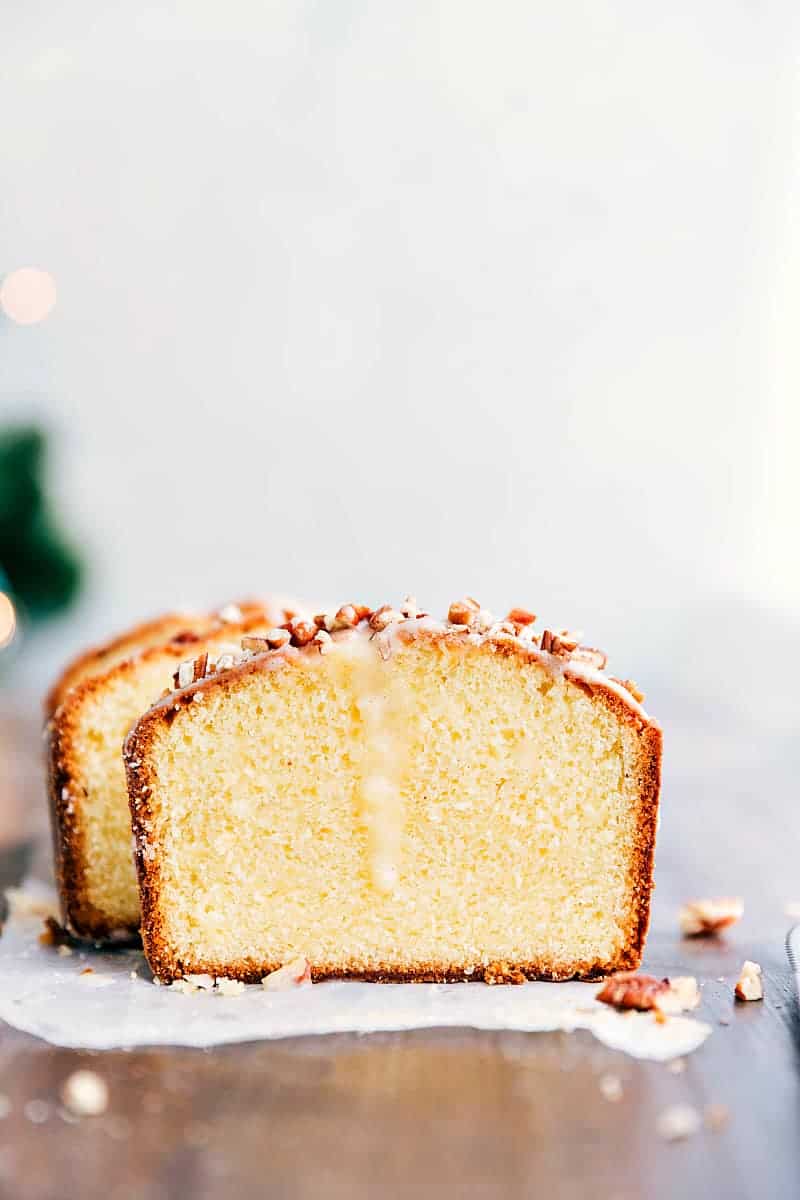 Glazed Eggnog Pound Cake is an easy to make tender and soft pound cake. It gets drizzled with a luscious glaze and is perfect for the holidays! Sliced Glazed Eggnog Pound Cake.