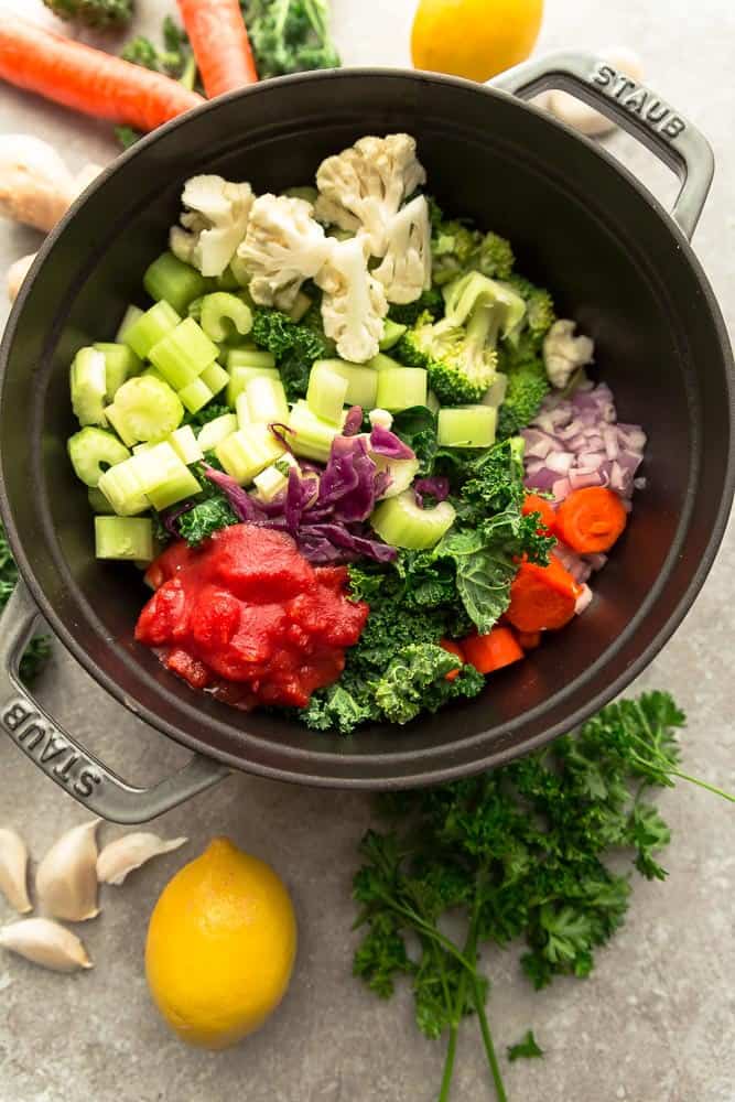 Vegetable Detox Soupย is an easy one pot recipe perfect for getting back on track for the new year! Best of all, it's comforting, flavorful and packed with lots of healthy vegetables. Vegetables cut and prepared in the pot