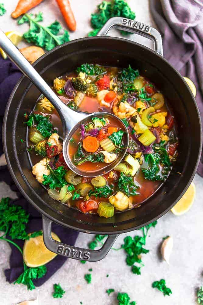 Vegetable Detox Soupย is an easy one pot recipe perfect for getting back on track for the new year! Best of all, it's comforting, flavorful and packed with lots of healthy vegetables. Vegetable detox soup in a pot with ladle