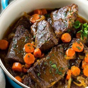 These fork tender root beer glazed short ribs are the perfect meal for a cold winter night. Serve them over mashed potatoes for a dinner that's sure to earn rave reviews from family and friends!