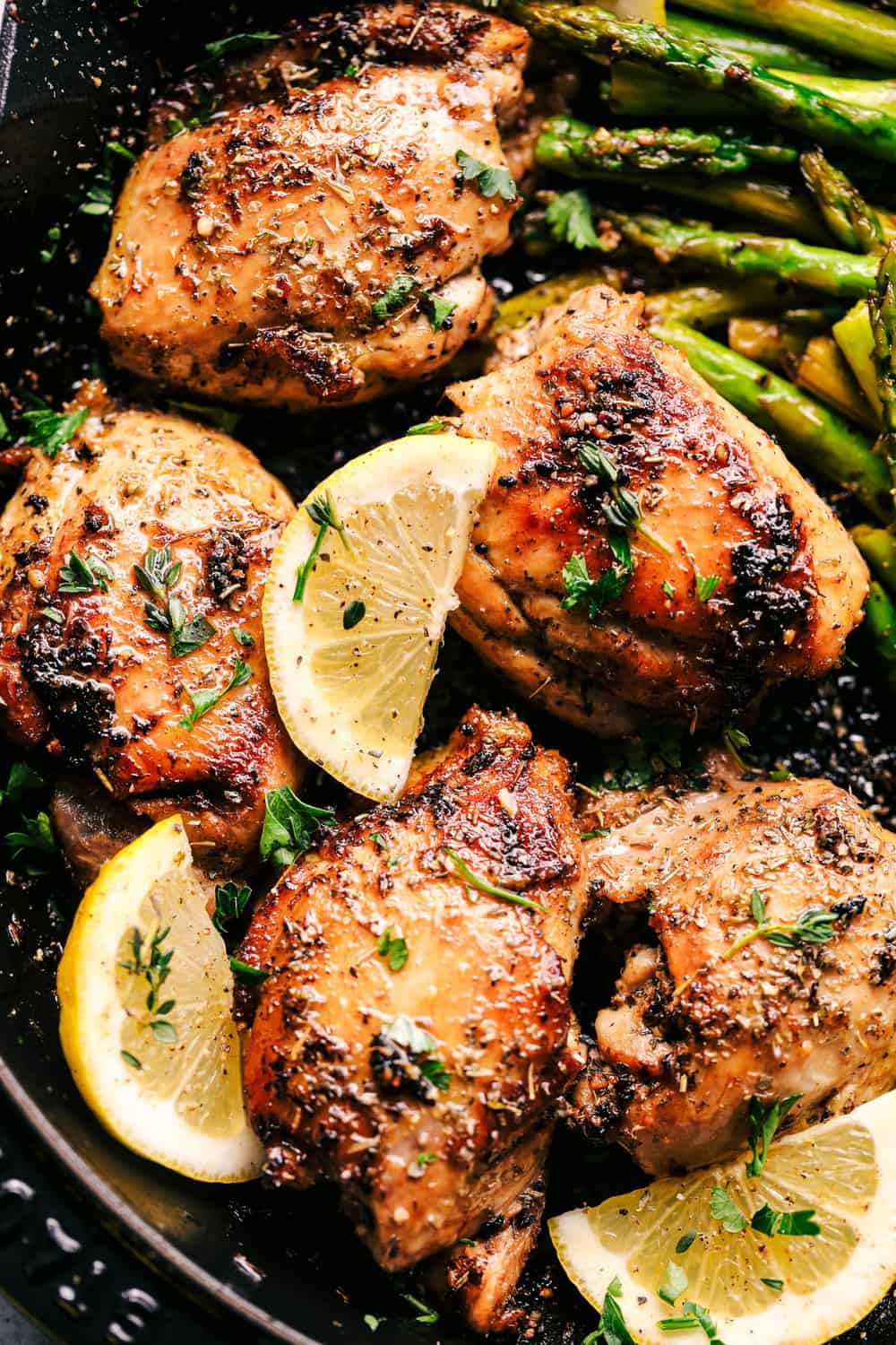 Lemon Garlic Butter Herb Chicken with Asparagus is the easiest 30 minute meal that is bursting with amazing flavor. Cooked in a buttery lemon garlic herb blend to tender juicy perfection with asparagus! Lemon garlic butter herb chicken with asparagus