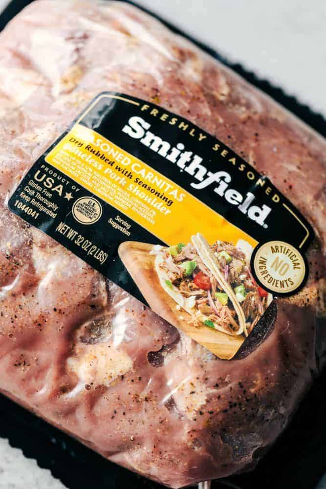 Creamy Pork Carnitas Pasta has crazy tender seasoned fresh pork with peppers and creamy pasta. All of the flavors you love about carnitas packed into a delicious meal! Smithfield pork in packaging.