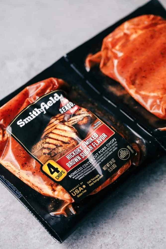 Grilled Spinach and Herb Stuffed Pork Chops are so easy to make and stuffed with a creamy parmesan spinach and herb mixture that takes these delicious and full of flavor pork chops to the next level! Smithfield Seasoned packaged pork chops.