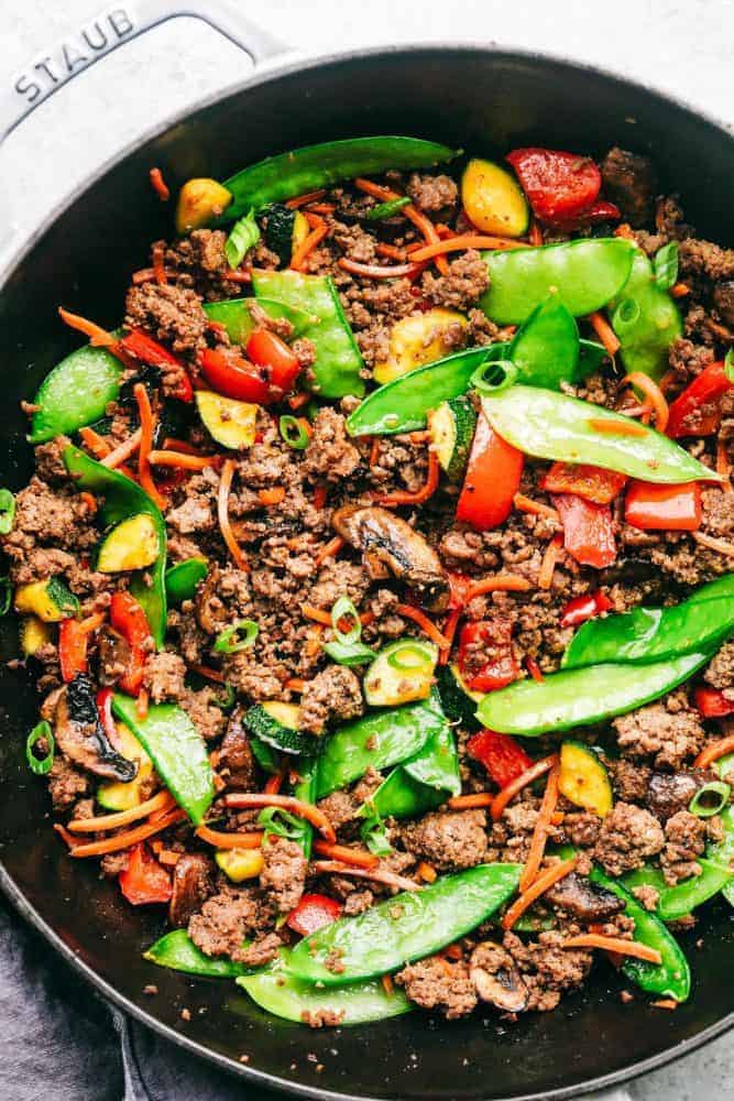 Korean Ground Beef Stir Fry is incredibly easy to make and has the best flavor! This is a recipe that my kids beg me to make every single week!ย Korean ground beef stir fry in a. Staub stir fry pan.