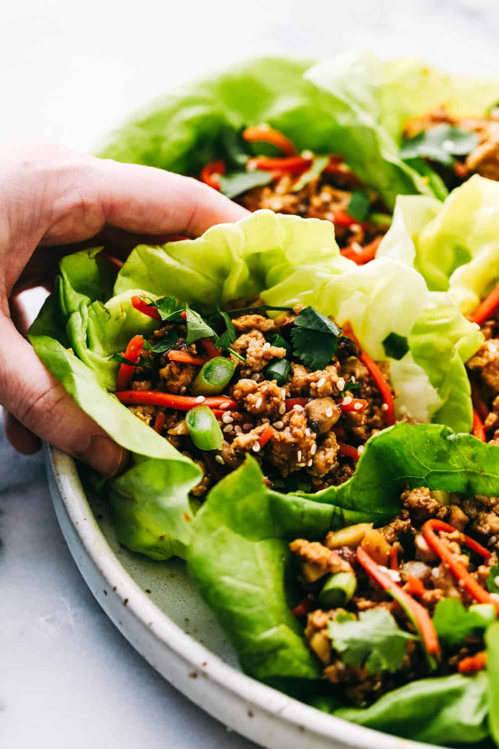 New Year new You! Lettuce wraps on a white plate