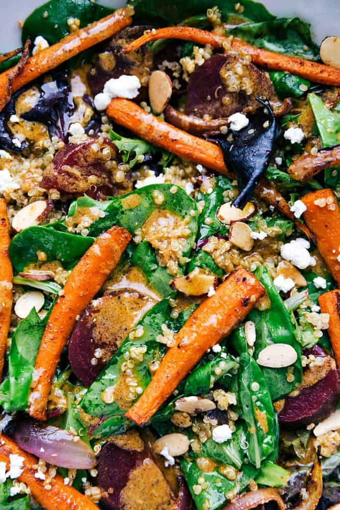 This roasted beet, quinoa, and carrot salad is packed with healthy and good-for-you ingredients! It's super flavorful and has the best lemon dressing! This roasted beet, quinoa, and carrot salad close up.