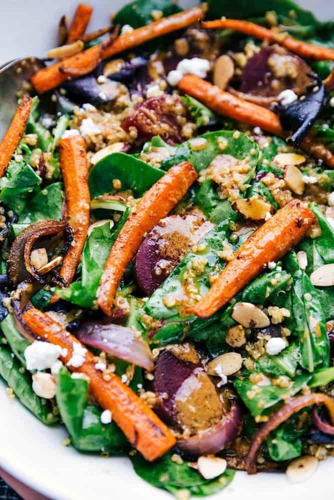 This roasted beet, quinoa, and carrot salad is packed with healthy and good-for-you ingredients! It's super flavorful and has the best lemon dressing! This roasted beet, quinoa, and carrot salad close up.